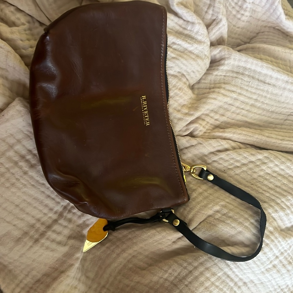 R.Riveter clutch wristlet